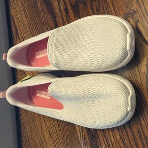 Skechers Slip-On Athletic Sneakers in Cream with Pink Insole